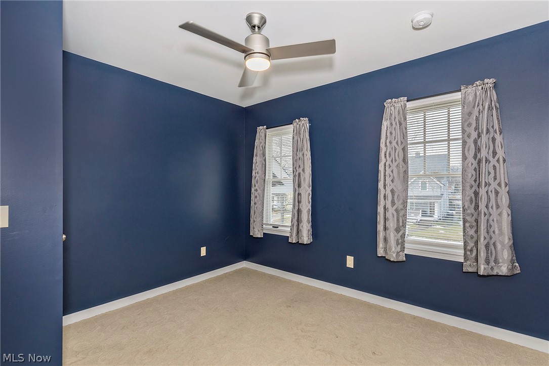 917 Brunswick Road Cleveland Heights, OH 44112 - Photo 32 of 42 Bedroom three with closet, ceiling fan and access to the third floor bonus room.