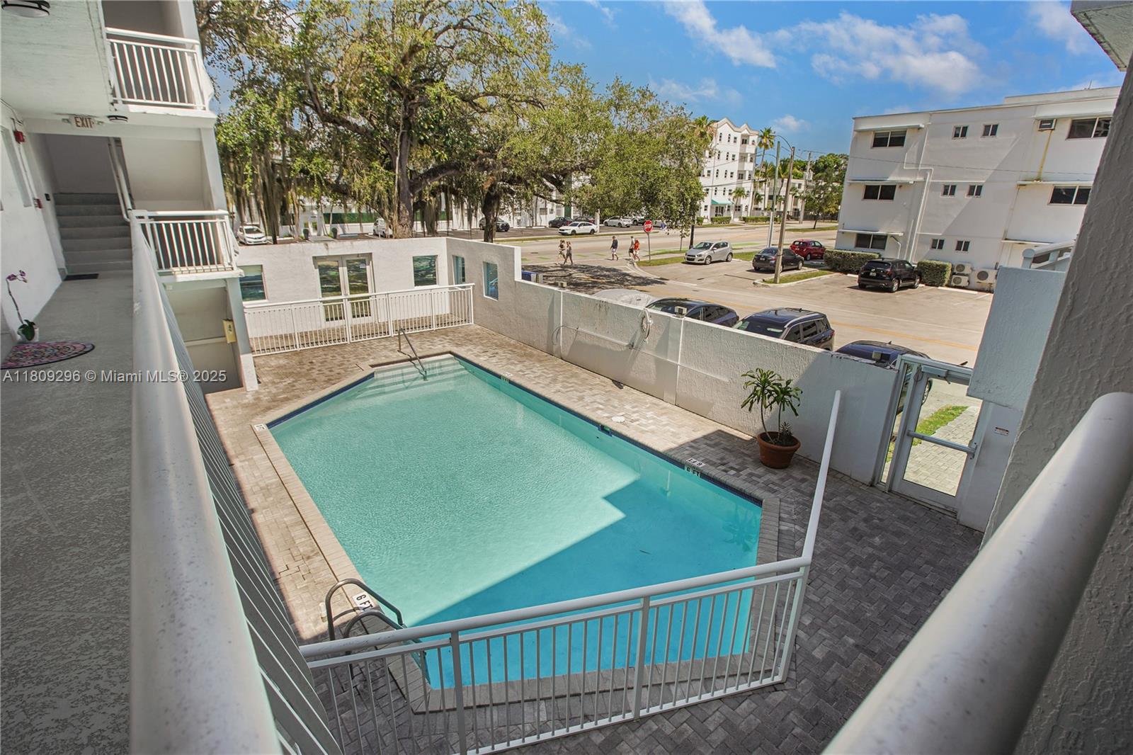 3101 Southwest 27th Avenue, Unit 203 Miami, FL 33133 - Photo 16 of 25 a view of a kitchen with furniture and a stove