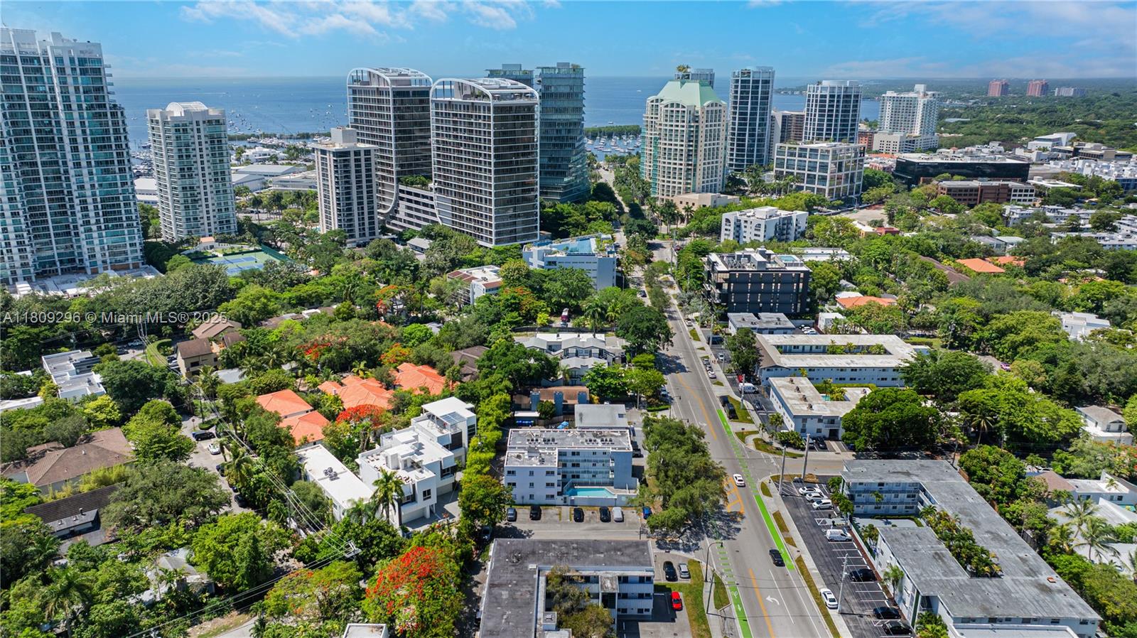 3101 Southwest 27th Avenue, Unit 203 Miami, FL 33133 - Photo 23 of 25 a view of a city with tall buildings