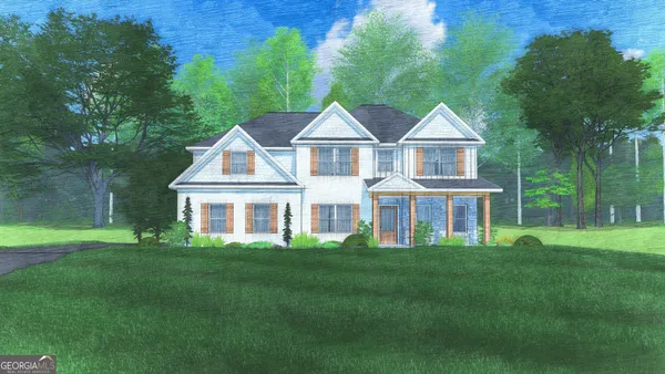 a front view of a house with a yard and trees