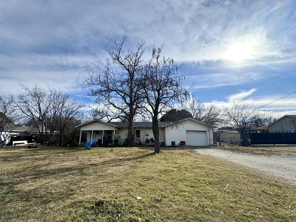 613 West Main Street Crowley, TX 76036 - Photo 2 of 30 Single story home featuring driveway and a garage