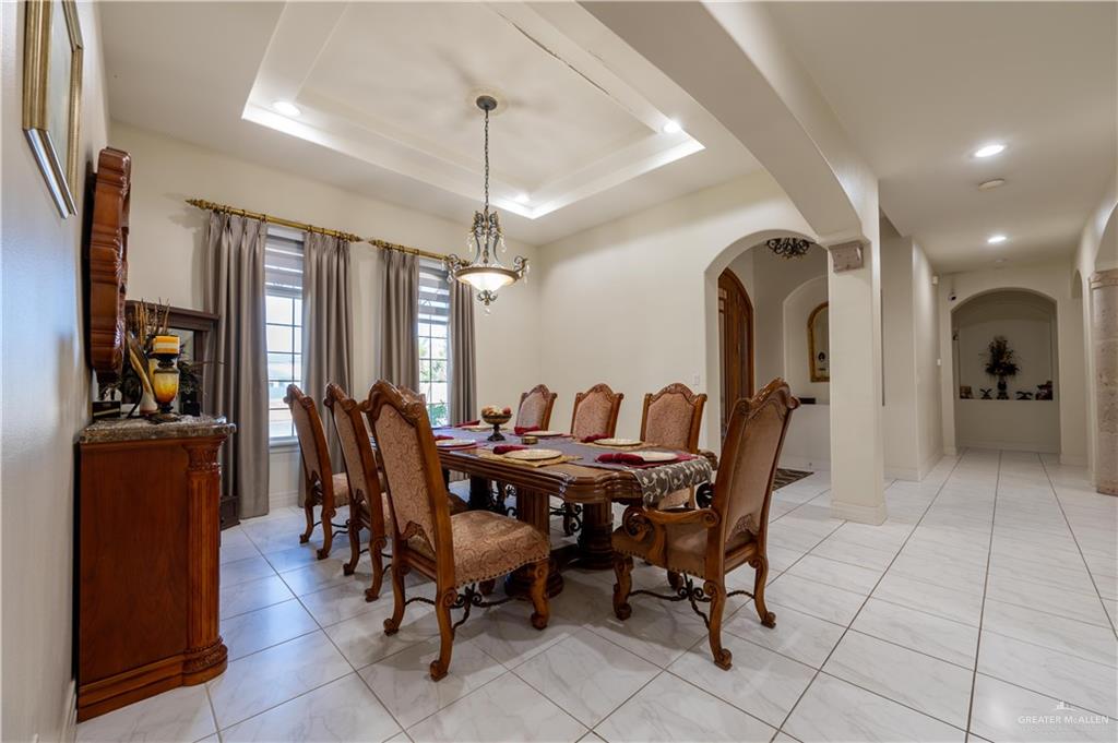 3801 South L Street McAllen, TX 78503 - Photo 2 of 38 a view of a dining room with furniture