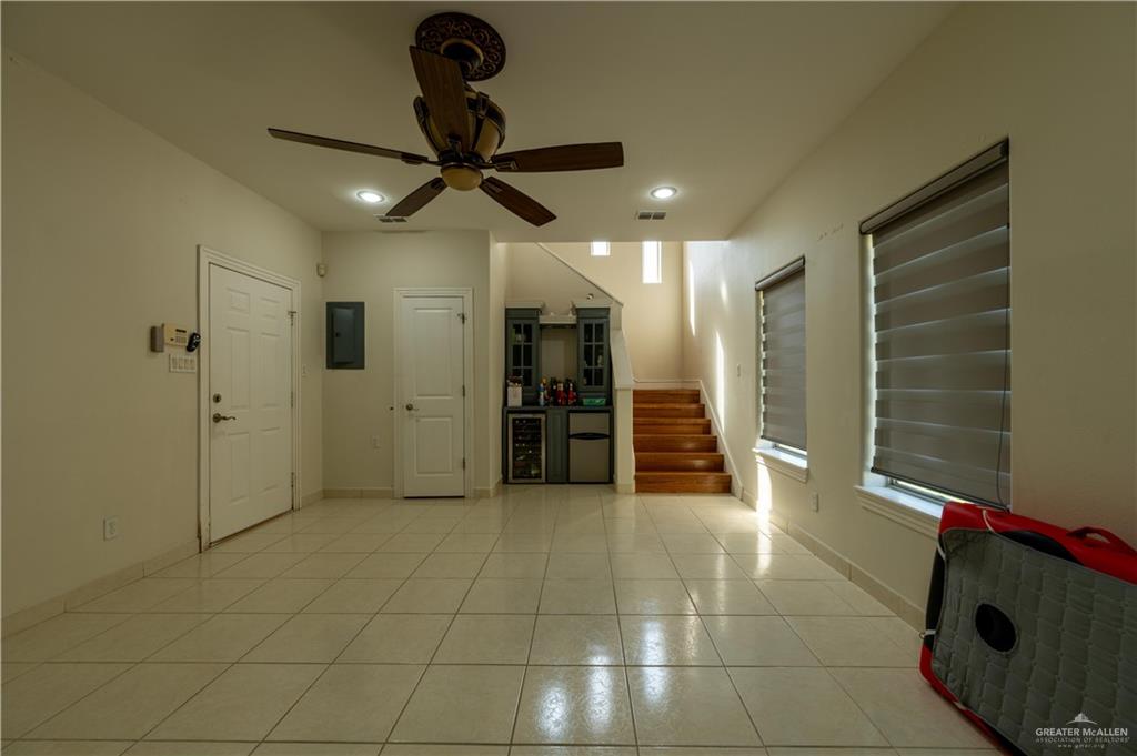 3801 South L Street McAllen, TX 78503 - Photo 25 of 38 a view of a livingroom with a staircase