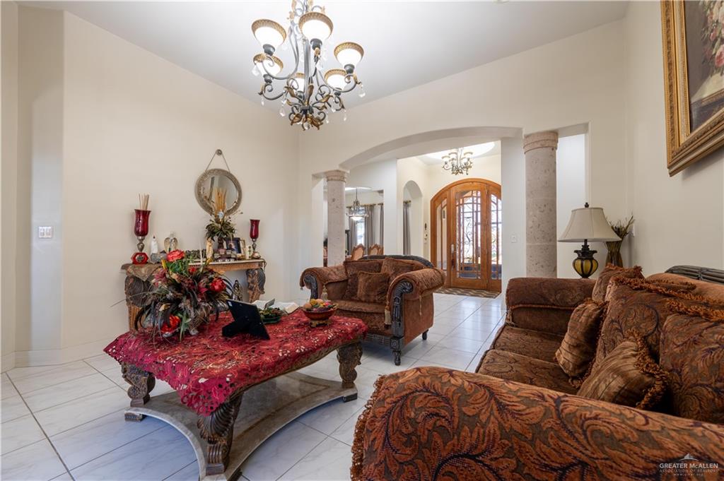 3801 South L Street McAllen, TX 78503 - Photo 4 of 38 a living room with furniture chandelier and a chandelier