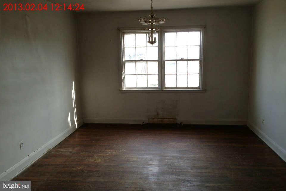 5417 Lothian Road Baltimore, MD 21212 - Photo 5 of 9 an empty room with a window