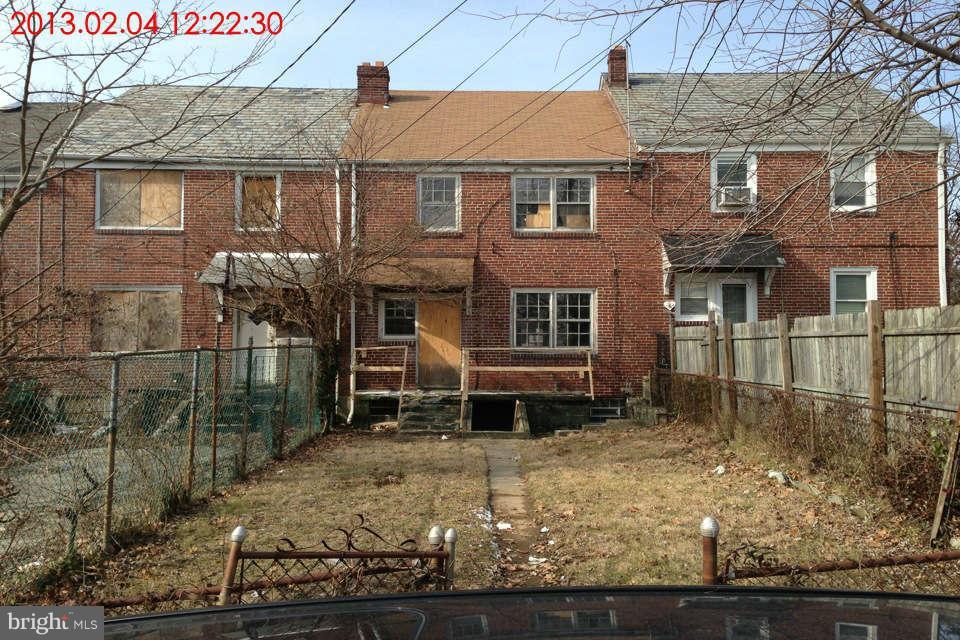 5417 Lothian Road Baltimore, MD 21212 - Photo 8 of 9 a front view of a house with a yard
