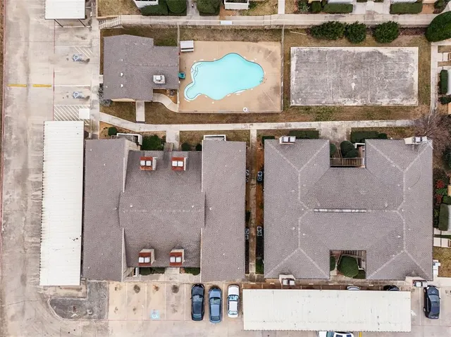 an aerial view of residential house with outdoor space