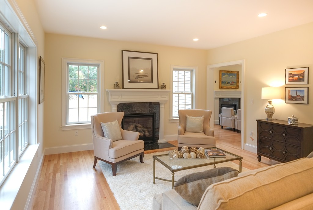 30 Michael Road Wayland, MA 01778 - Photo 4 of 24 a living room with furniture and a fireplace