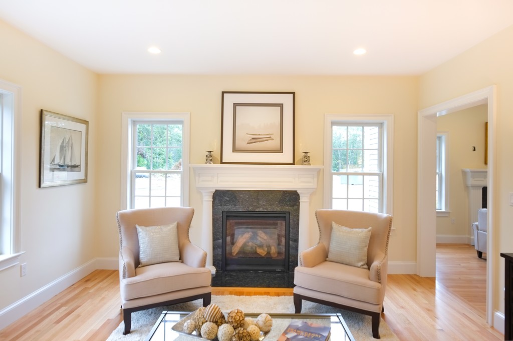 30 Michael Road Wayland, MA 01778 - Photo 10 of 24 a living room with furniture and a fireplace