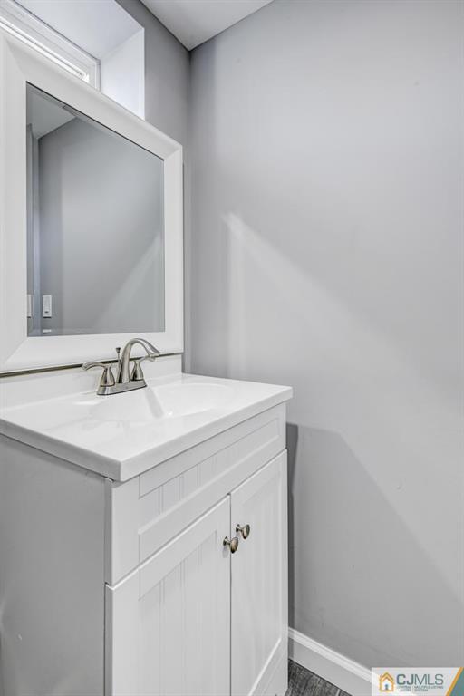 30 Purdue Road Old Bridge, NJ 08859 - Photo 14 of 25 a bathroom with a sink and a mirror