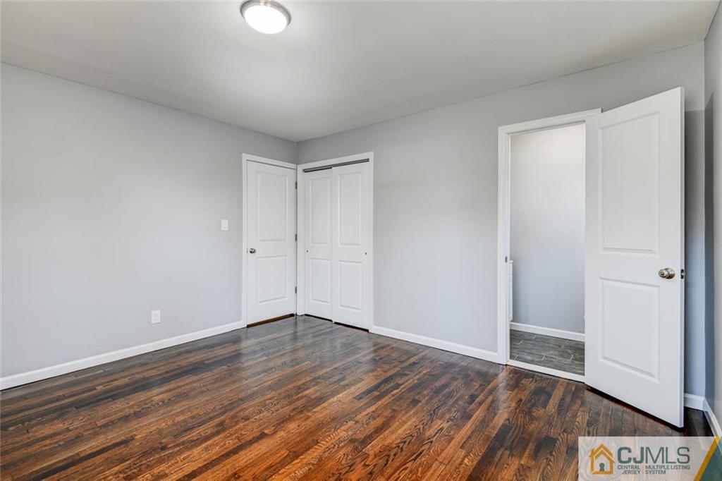 30 Purdue Road Old Bridge, NJ 08859 - Photo 15 of 25 a view of an empty room with wooden floor