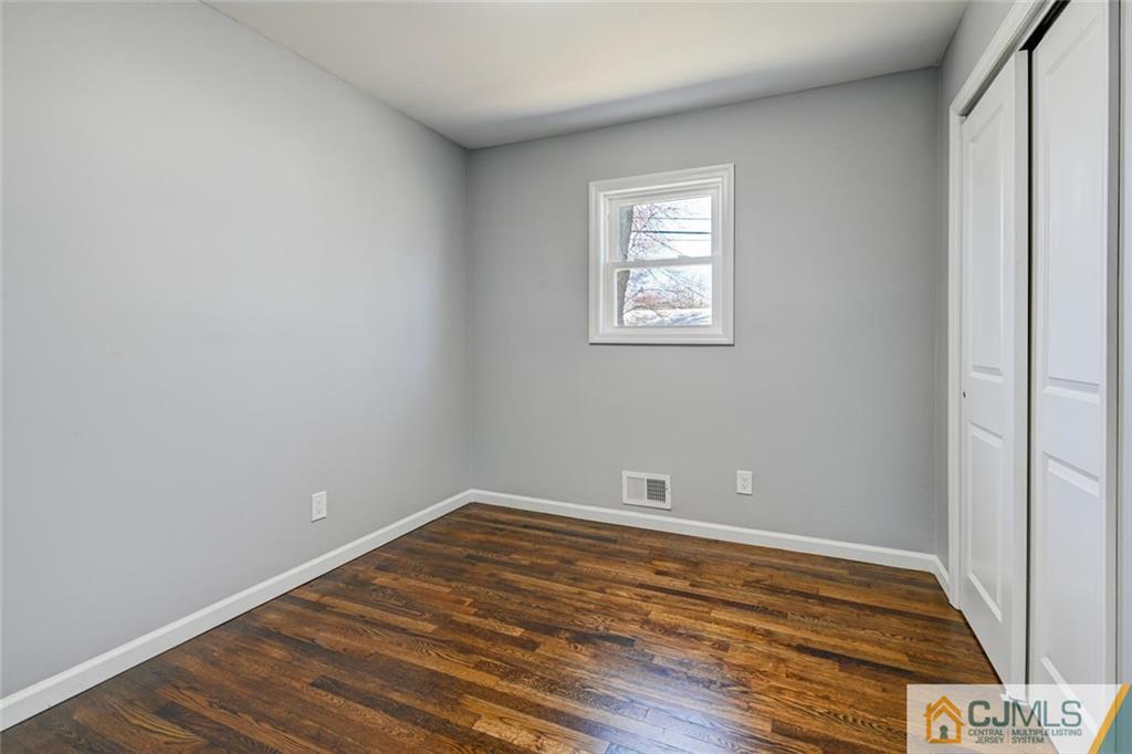 30 Purdue Road Old Bridge, NJ 08859 - Photo 16 of 25 wooden floor in an empty room