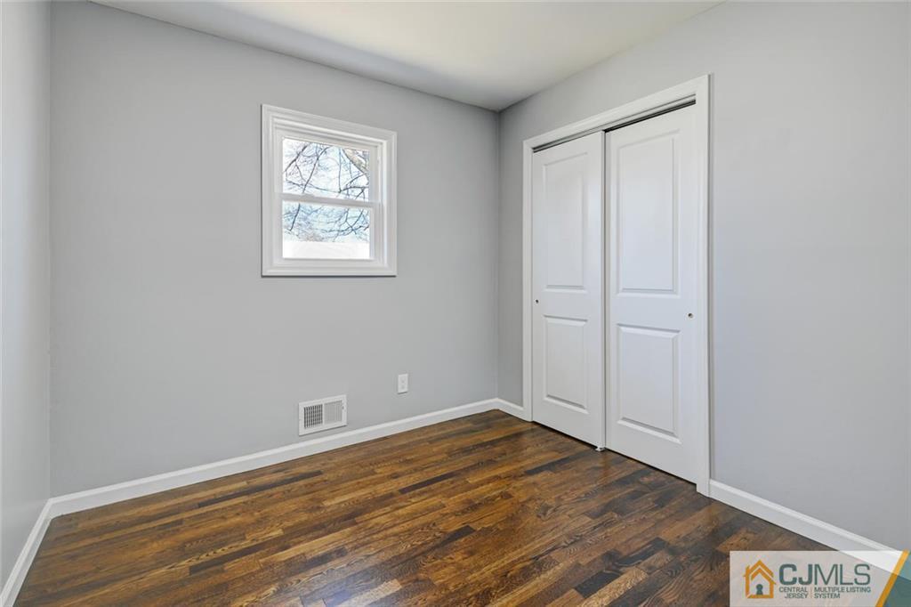 30 Purdue Road Old Bridge, NJ 08859 - Photo 17 of 25 wooden floor in an empty room