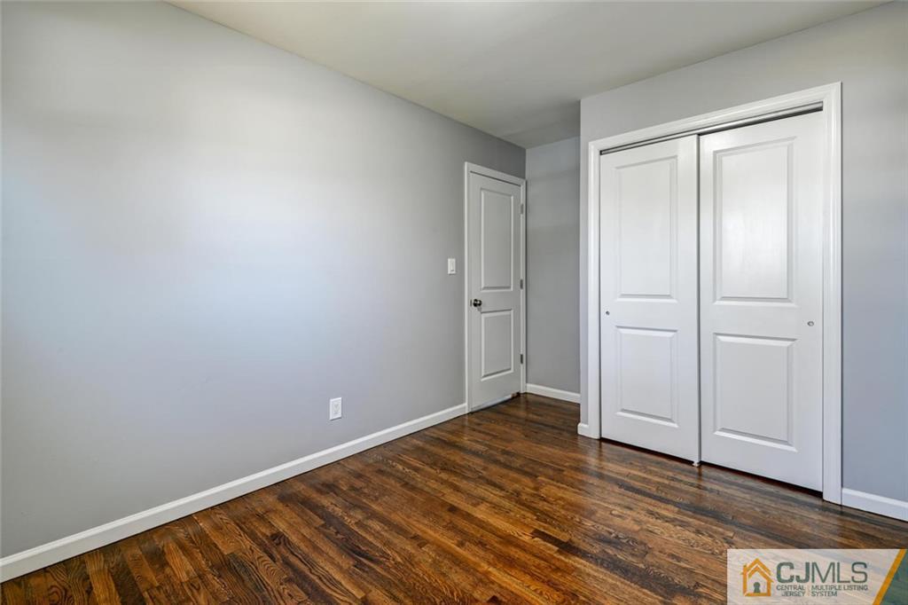 30 Purdue Road Old Bridge, NJ 08859 - Photo 18 of 25 a view of an empty room with wooden floor