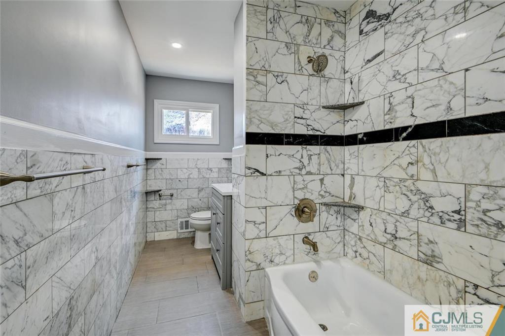 30 Purdue Road Old Bridge, NJ 08859 - Photo 19 of 25 a bathroom with a bathtub and shower