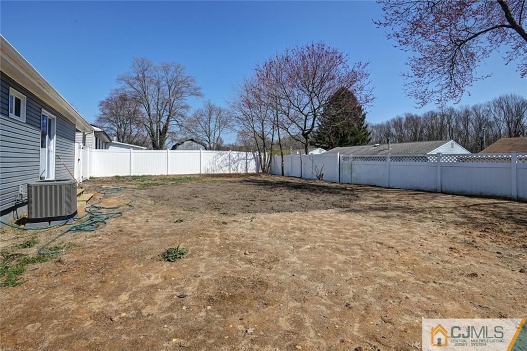30 Purdue Road Old Bridge, NJ 08859 - Photo 24 of 25 a view of a yard with a house