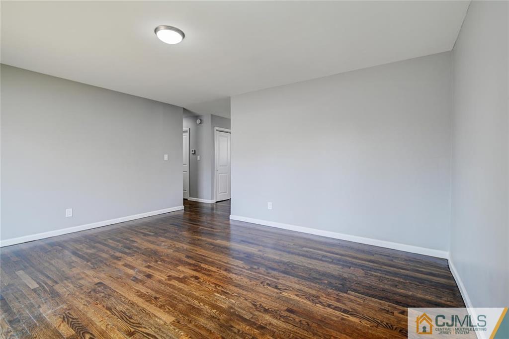 30 Purdue Road Old Bridge, NJ 08859 - Photo 10 of 25 a view of an empty room and wooden floor