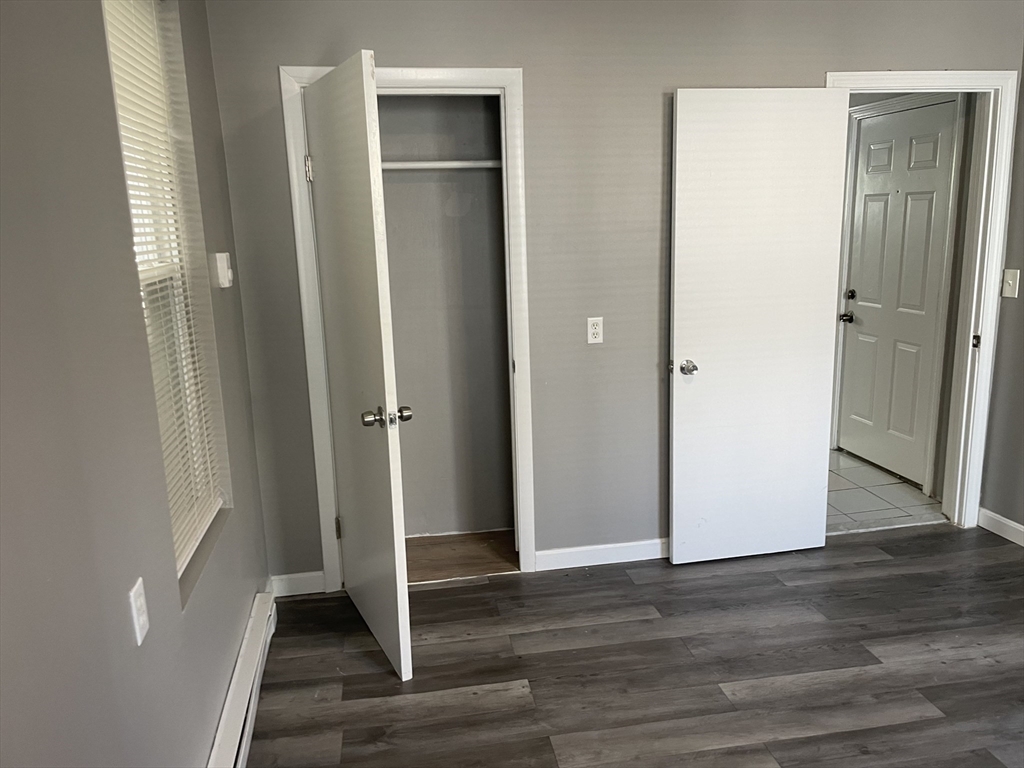 8 Cheever Court, Unit 1 Boston, MA 02128 - Photo 13 of 16 a view of wooden door