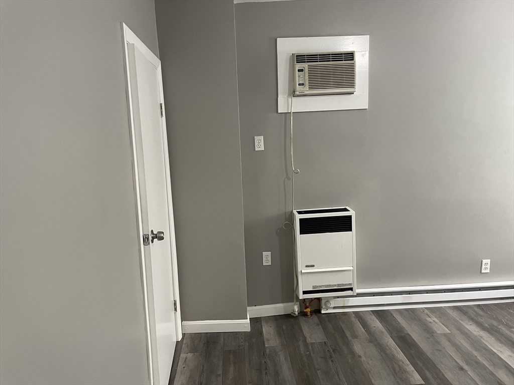 8 Cheever Court, Unit 1 Boston, MA 02128 - Photo 15 of 16 a view of a livingroom with wooden floor