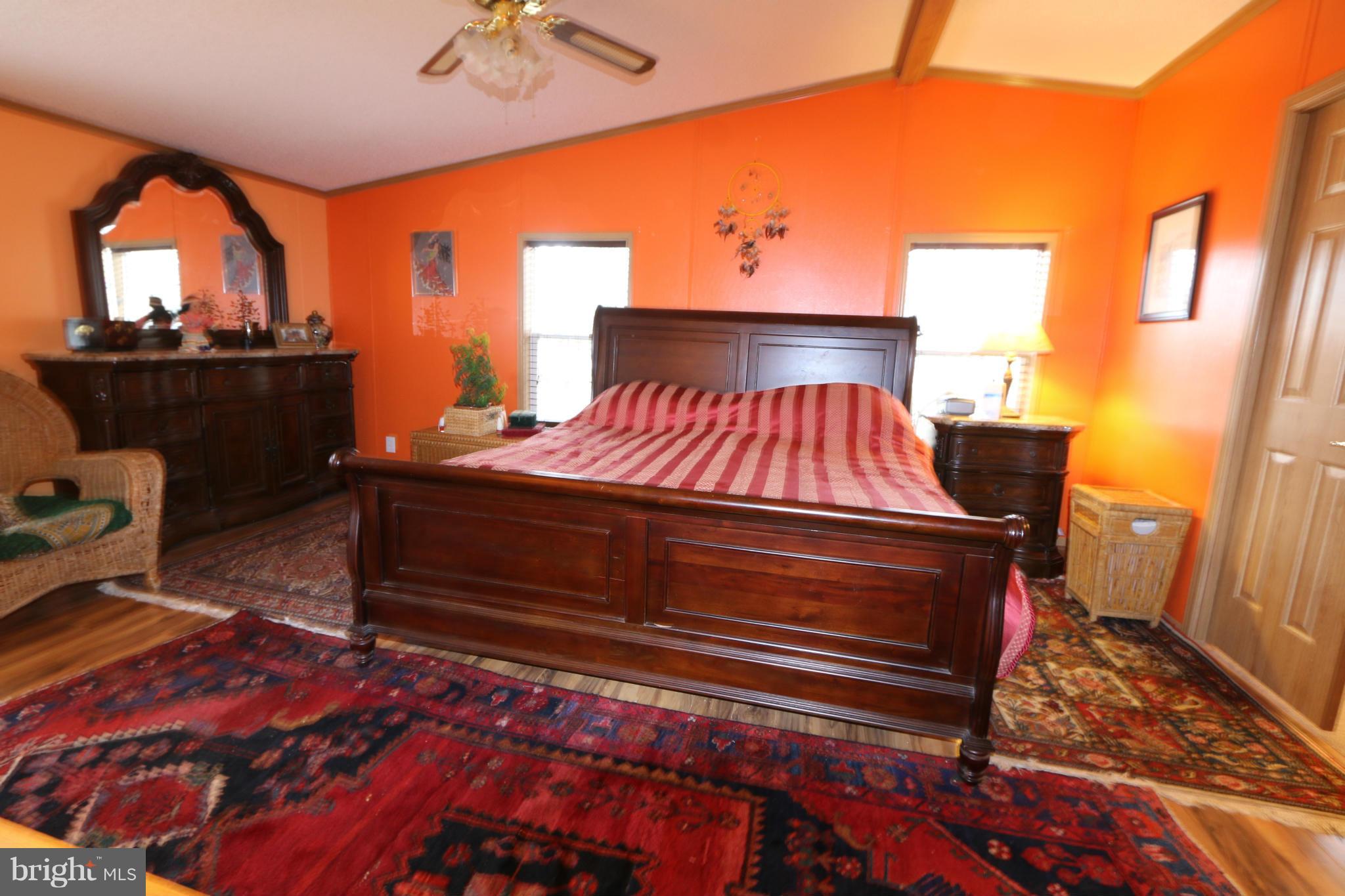 24709 Raven Rock Road Smithsburg, MD 21783 - Photo 11 of 20 a bed sitting in a room next to a window