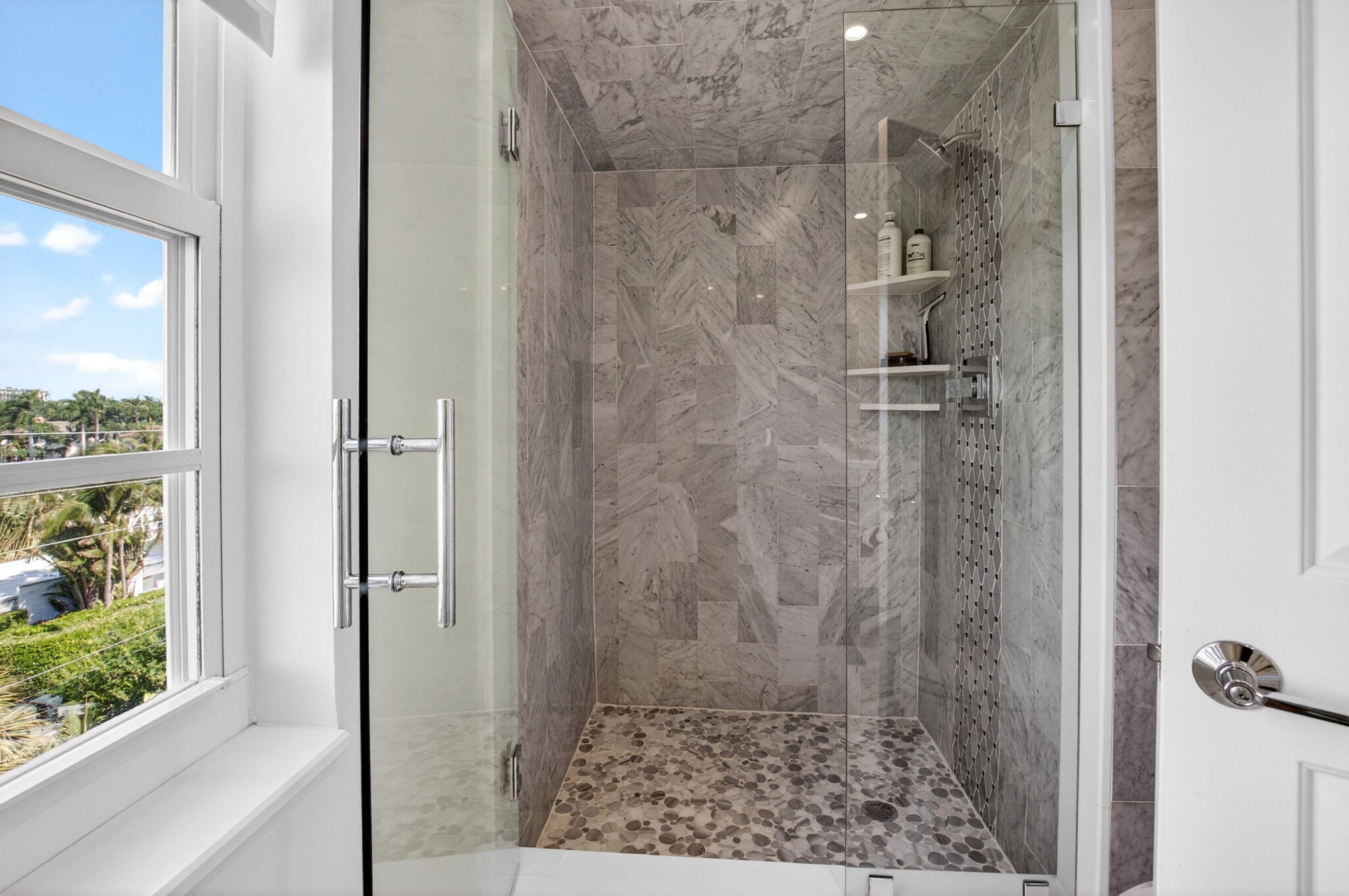 950 De Soto Road, Unit 5A Boca Raton, FL 33432 - Photo 43 of 98 a bathroom with a shower and a sink