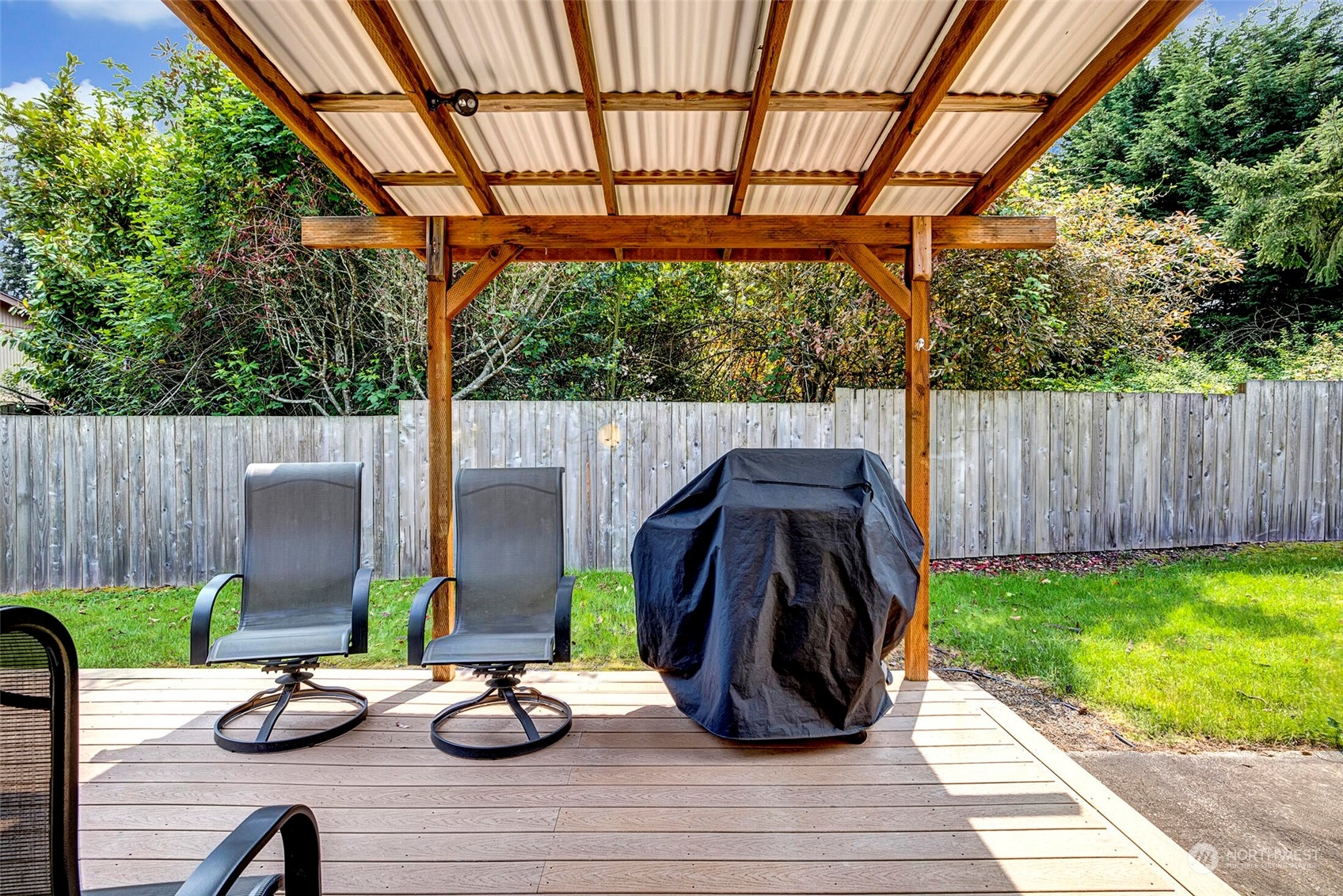 2525 Northeast 27th Street Renton, WA 98056 - Photo 13 of 30 a view of a backyard with sitting area and furniture