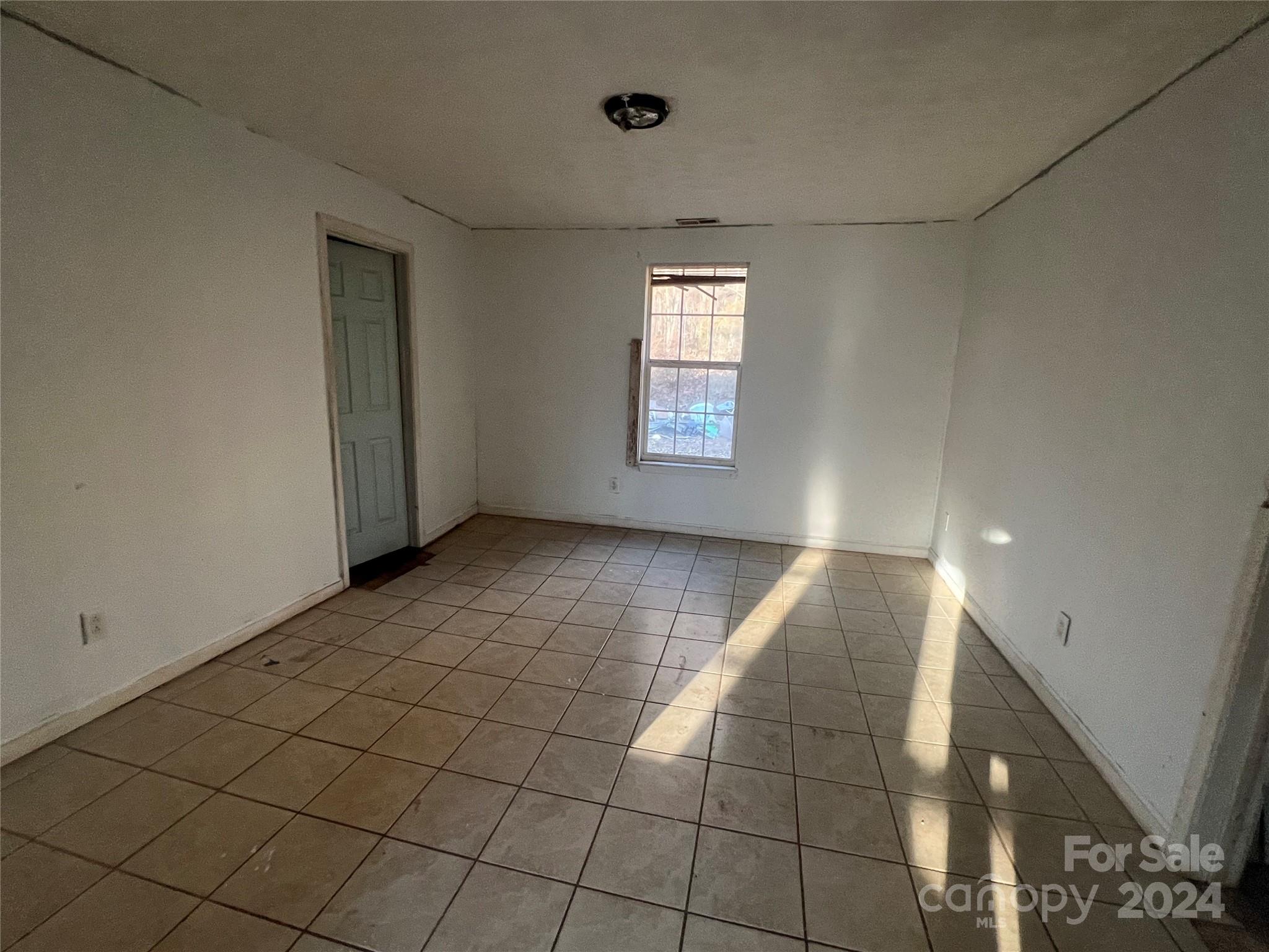 789 Groves Road Union Mills, NC 28167 - Photo 19 of 30 a view of an empty room and window