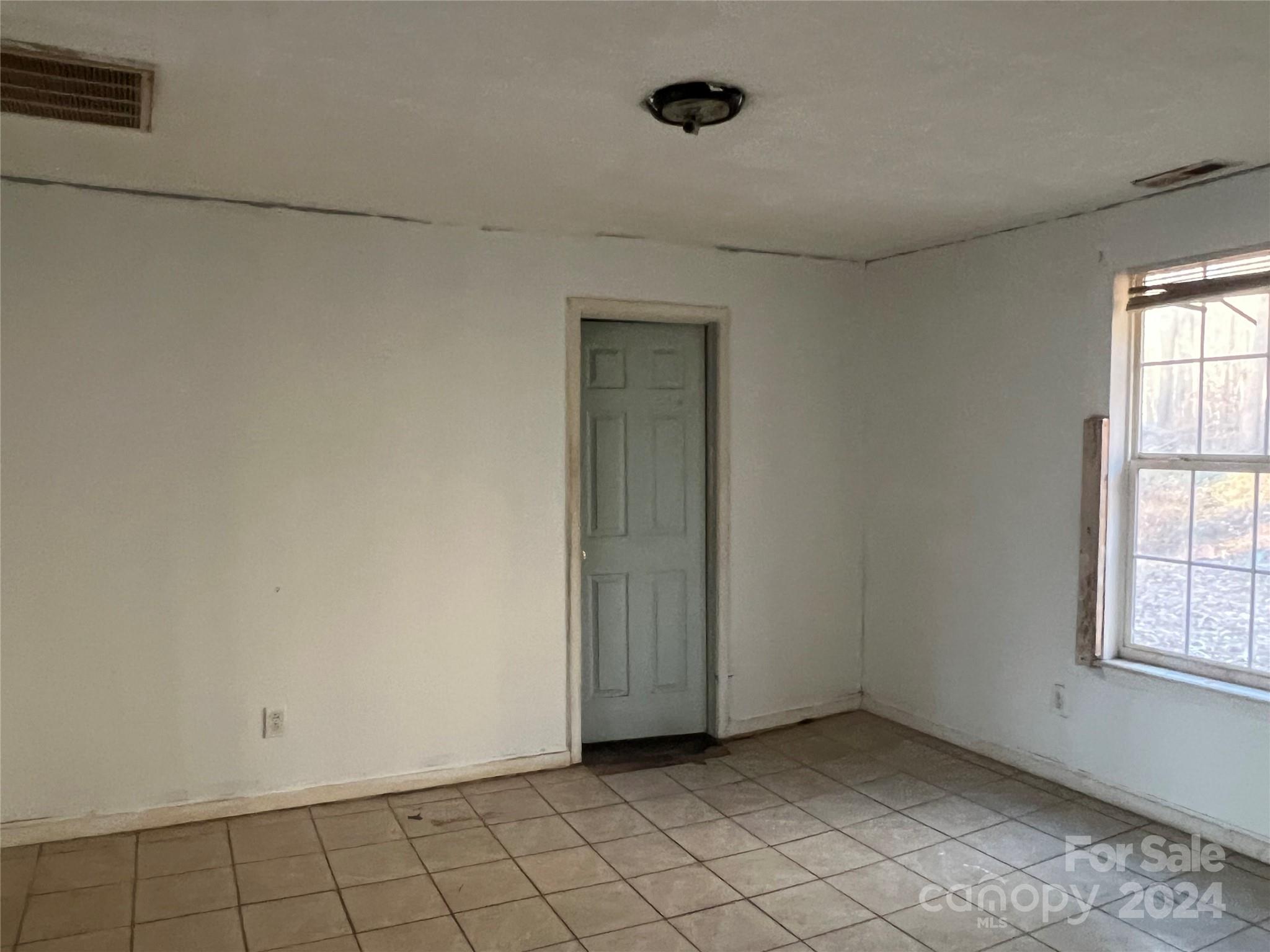 789 Groves Road Union Mills, NC 28167 - Photo 10 of 30 an empty room with windows