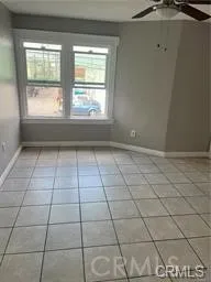 a view of an empty room and window