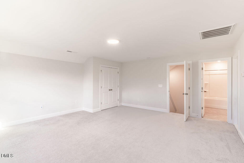 717 Ressler Street Holly Springs, NC 27540 - Photo 26 of 32 a view of an empty room