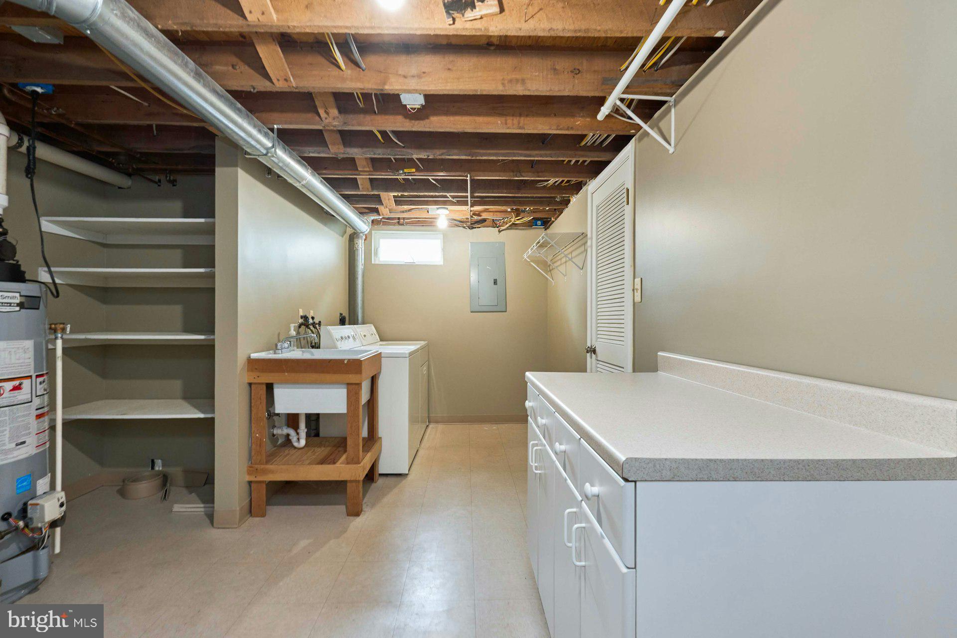 6586 Braddock Road Alexandria, VA 22312 - Photo 43 of 57 Laundry and utilities