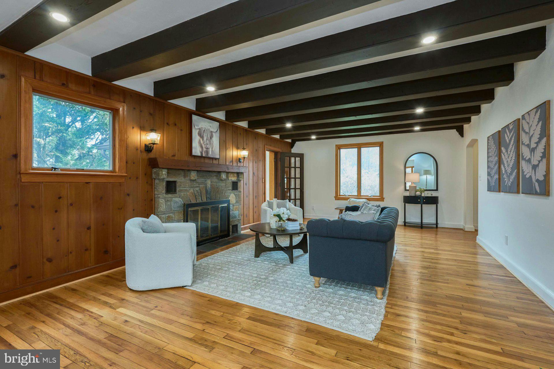 6586 Braddock Road Alexandria, VA 22312 - Photo 9 of 57 Living room features original wood wall