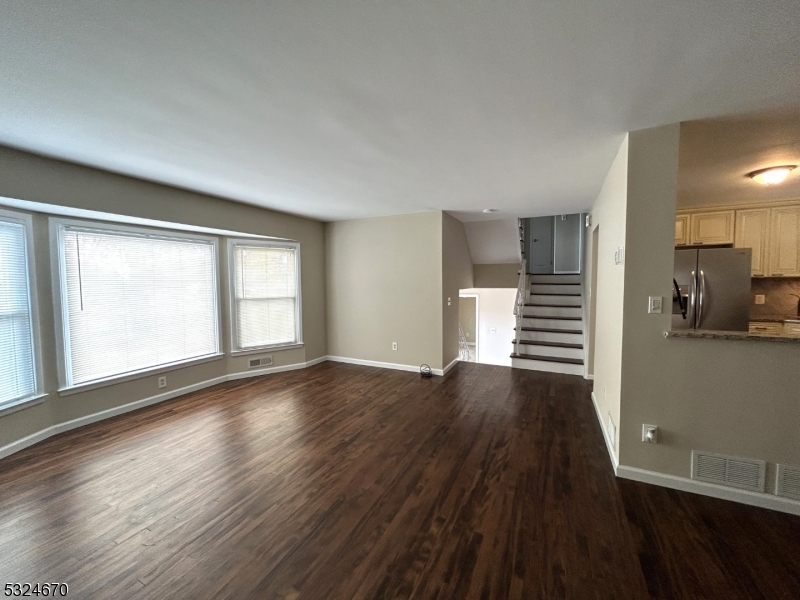 48 Glen Road Bridgewater, NJ 08805 - Photo 16 of 43 an empty room with wooden floor and windows