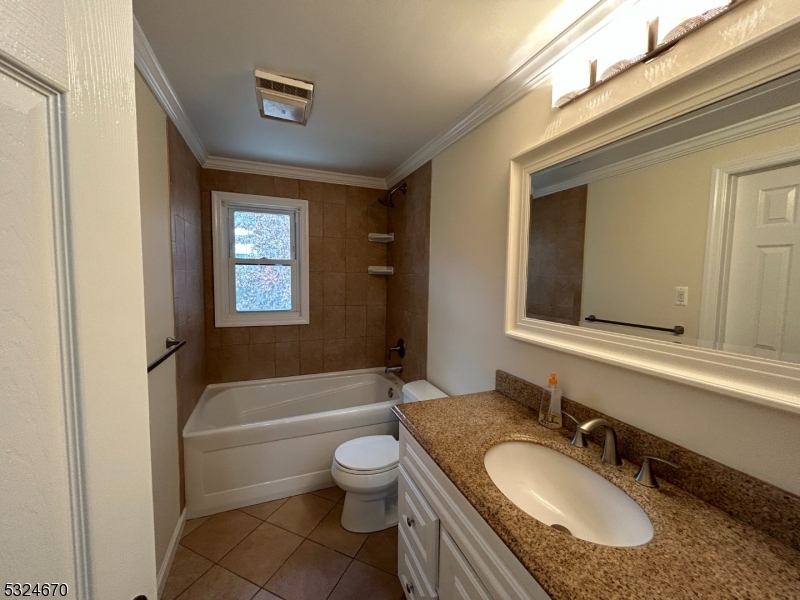 48 Glen Road Bridgewater, NJ 08805 - Photo 17 of 43 a bathroom with a granite countertop sink toilet and shower