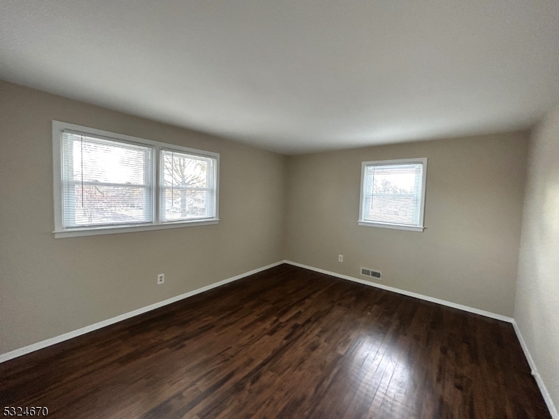 48 Glen Road Bridgewater, NJ 08805 - Photo 21 of 43 a view of a room with wooden floor and windows