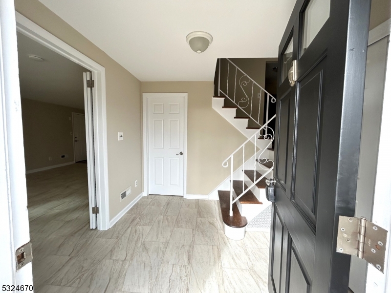 48 Glen Road Bridgewater, NJ 08805 - Photo 3 of 43 a view of entryway and hall with wooden floor