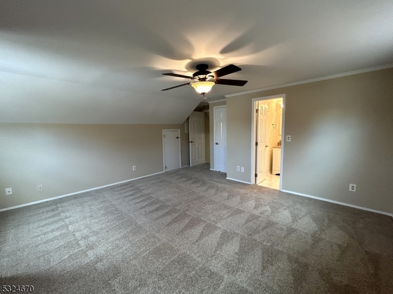 48 Glen Road Bridgewater, NJ 08805 - Photo 33 of 43 a view of an empty room and a ceiling fan