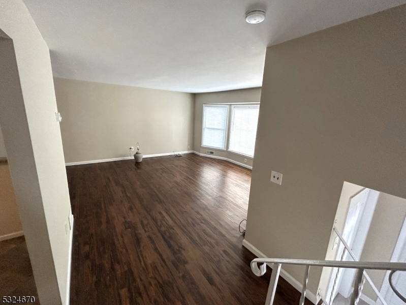 48 Glen Road Bridgewater, NJ 08805 - Photo 34 of 43 wooden floor in an empty room with a window