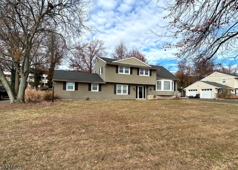 48 Glen Road Bridgewater, NJ 08805 - Photo 41 of 43 a front view of a house with a yard
