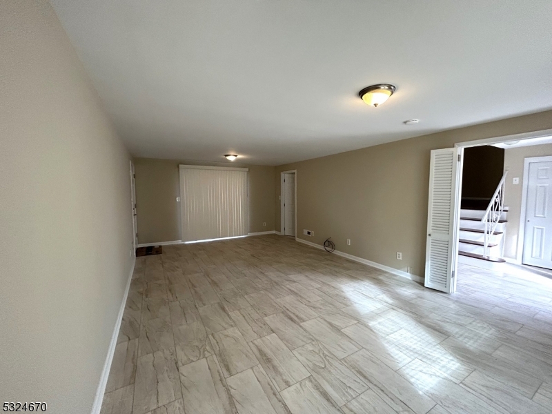 48 Glen Road Bridgewater, NJ 08805 - Photo 7 of 43 a view of a livingroom with wooden floor