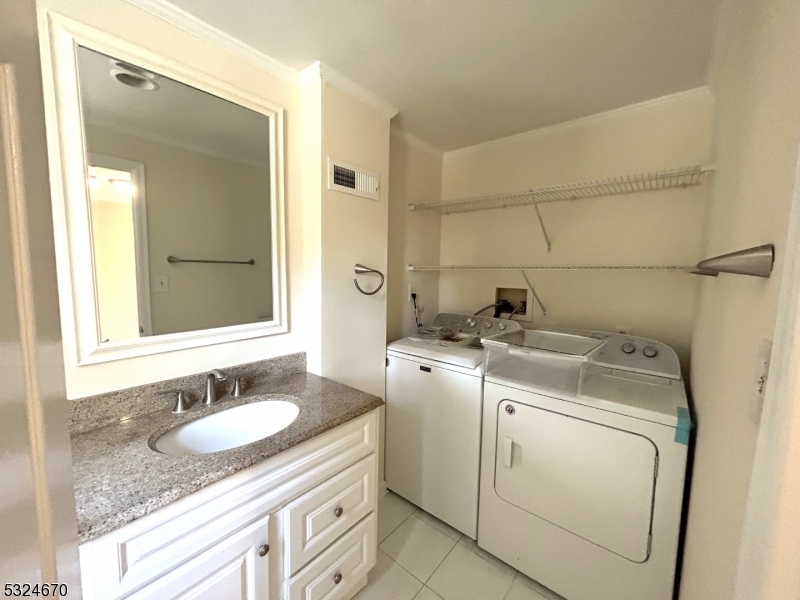 48 Glen Road Bridgewater, NJ 08805 - Photo 8 of 43 a bathroom with a sink and a mirror