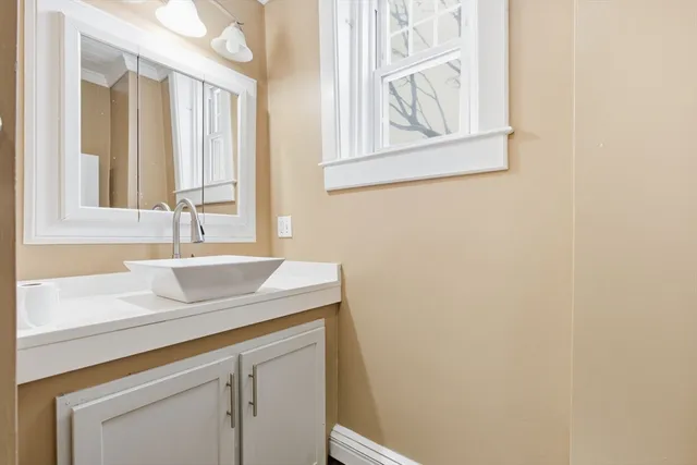a view of a sink and a mirror