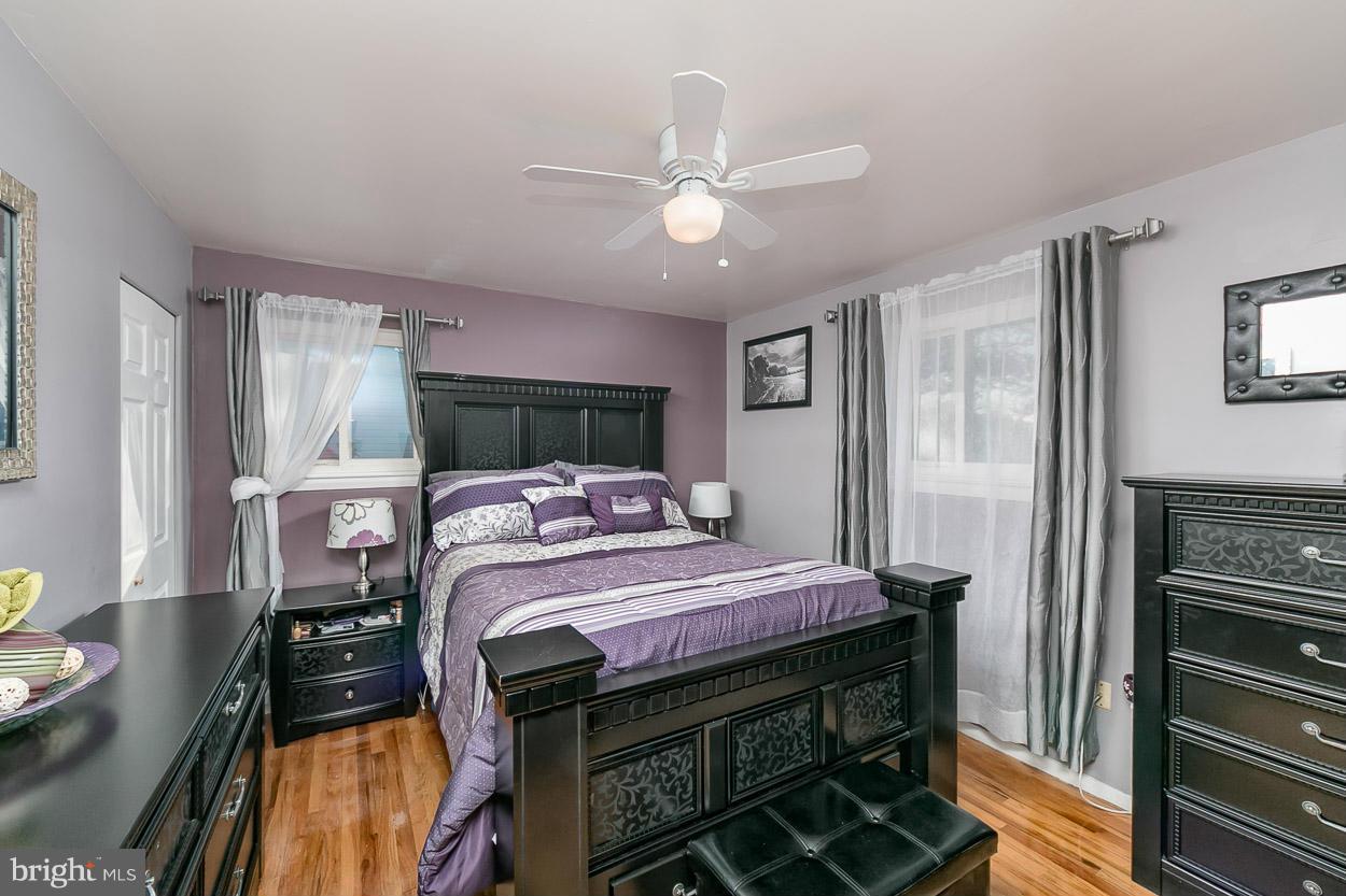 3902 Nemo Road Randallstown, MD 21133 - Photo 14 of 29 a bed room with a bed and a chandelier