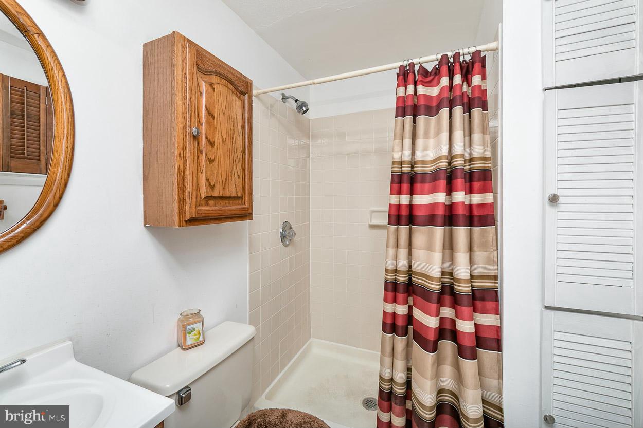 3902 Nemo Road Randallstown, MD 21133 - Photo 23 of 29 a bathroom with a shower and a sink
