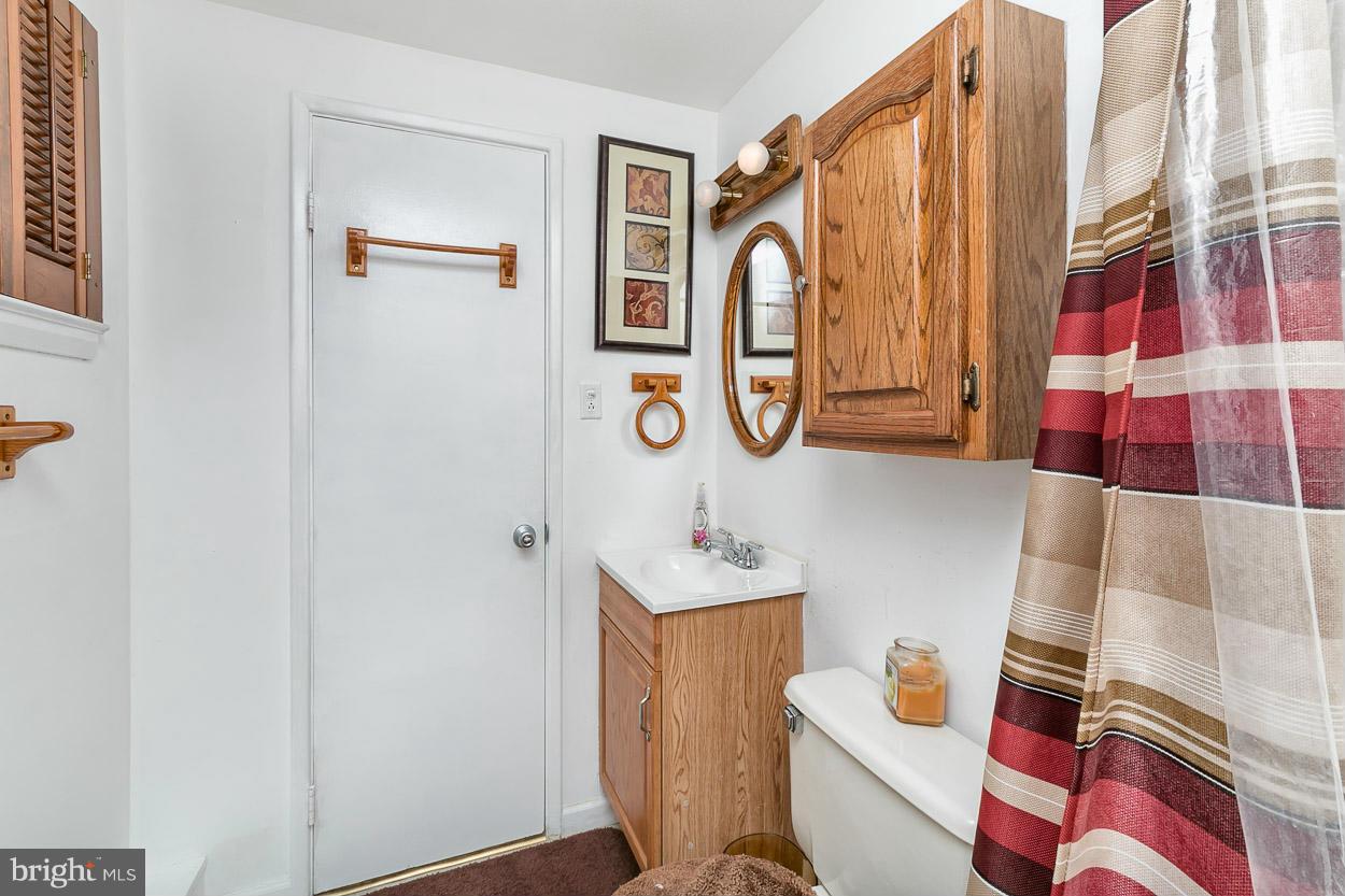 3902 Nemo Road Randallstown, MD 21133 - Photo 24 of 29 a bathroom with a sink toilet and shower