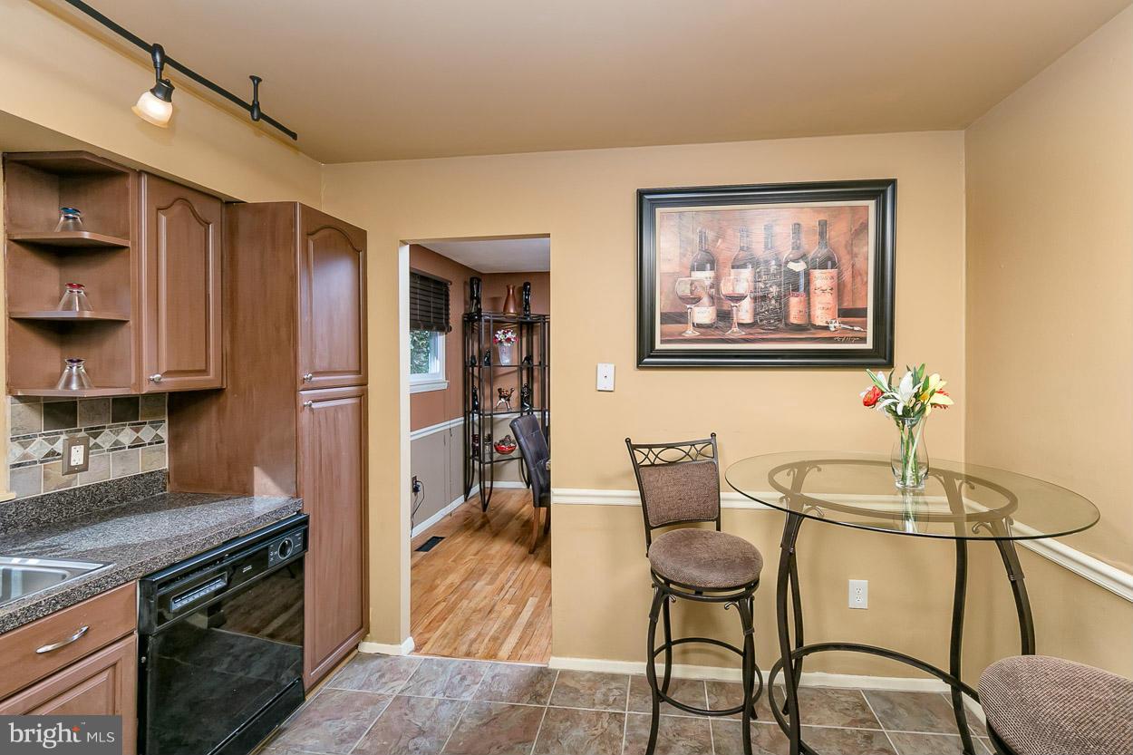 3902 Nemo Road Randallstown, MD 21133 - Photo 6 of 29 a dining room with furniture and wooden floor