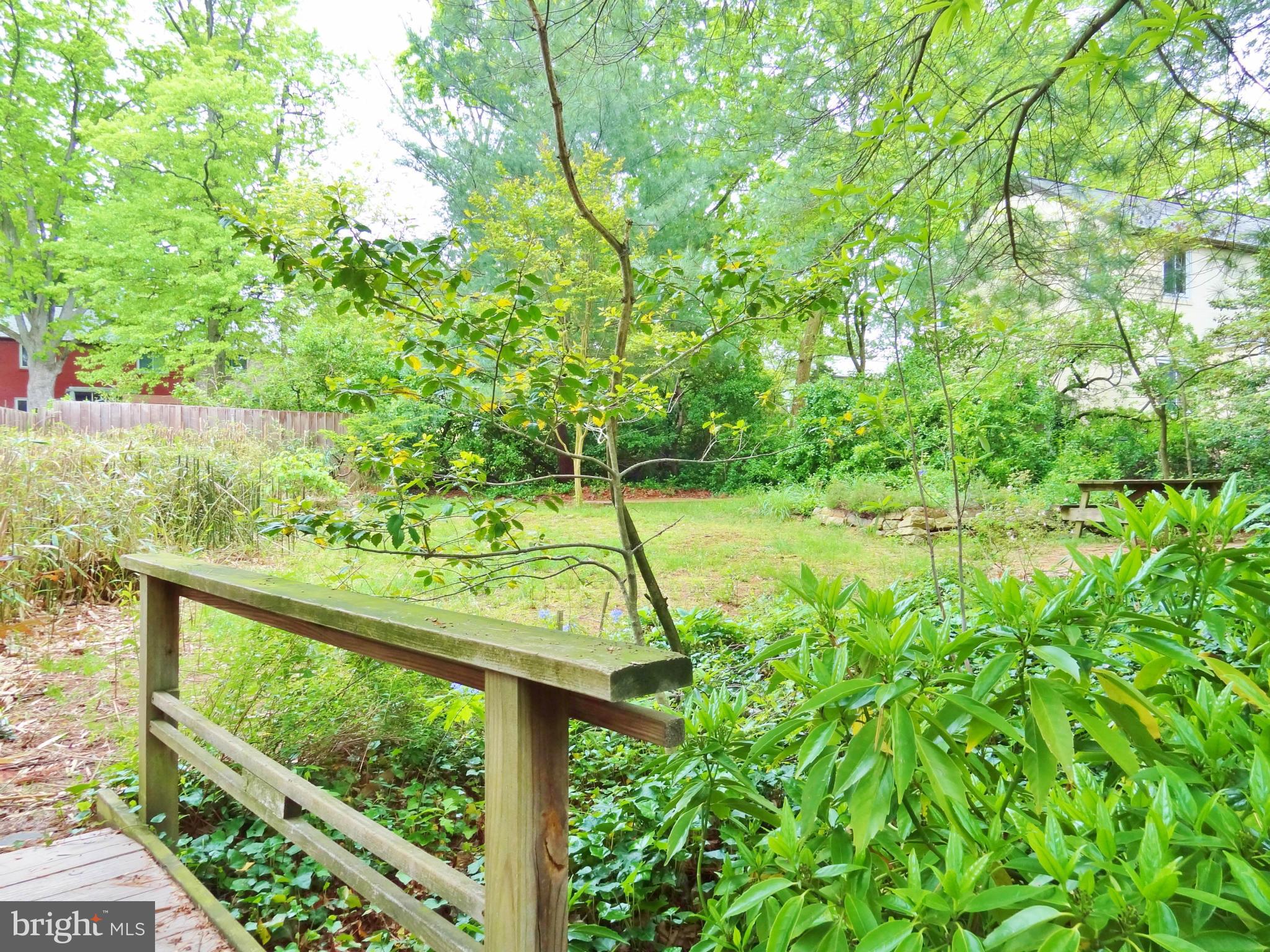 17 Ridge Road, Unit G Greenbelt, MD 20770 - Photo 3 of 16 Garden bridge and spacious wooded yard