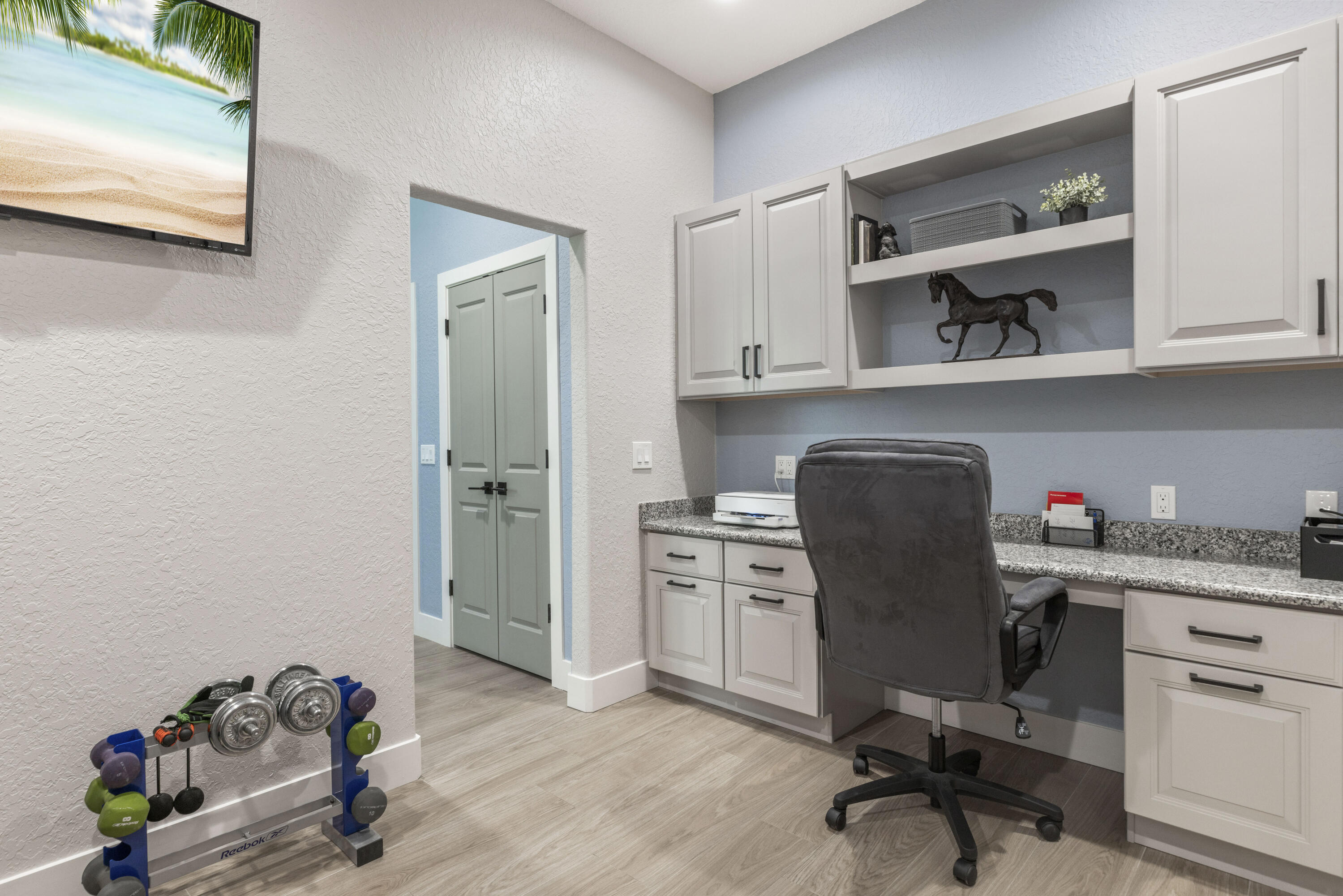 4544 Celestial Drive Grant Valkaria, FL 32949 - Photo 37 of 73 a view of a workspace with furniture and a window