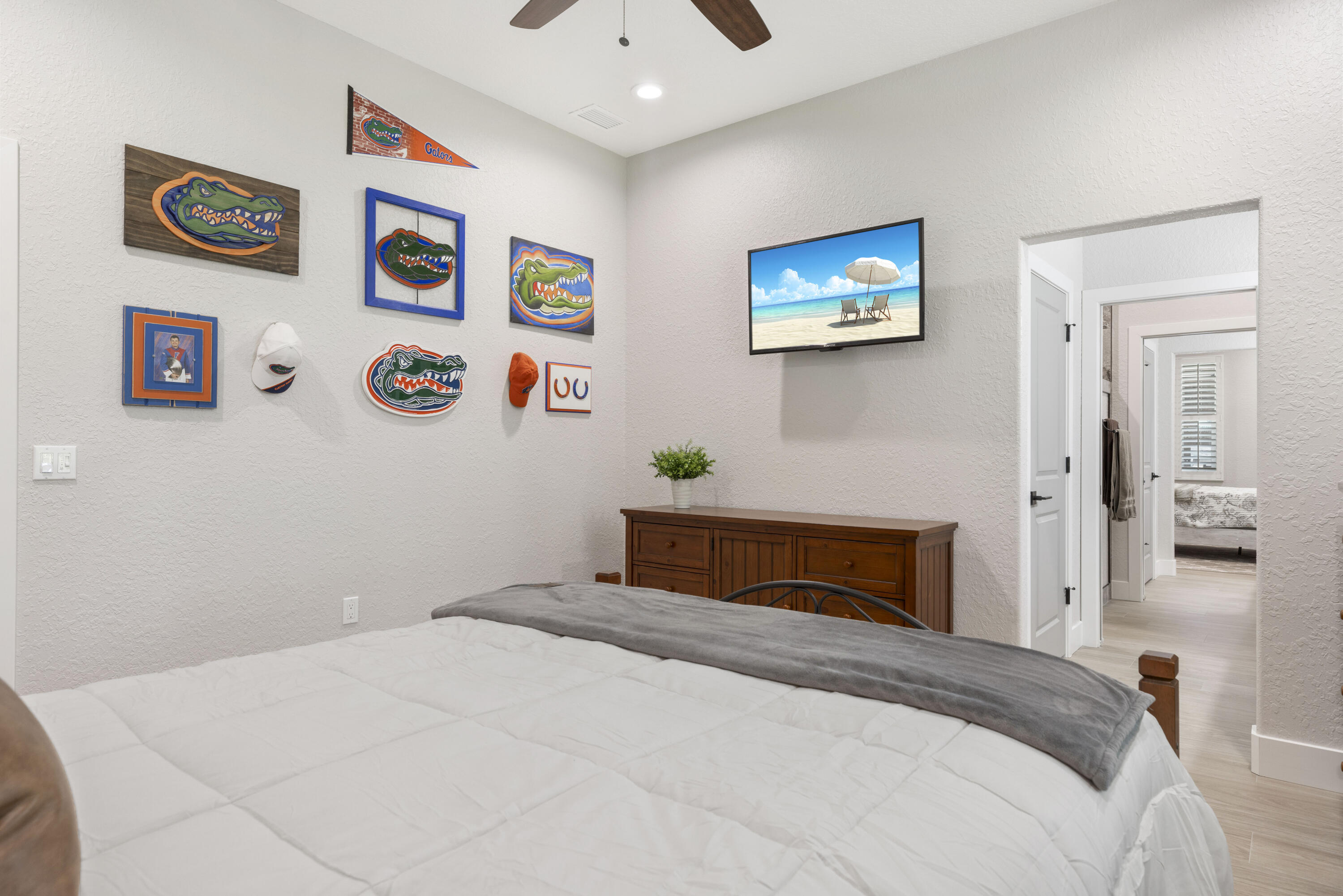 4544 Celestial Drive Grant Valkaria, FL 32949 - Photo 47 of 73 a bedroom with a large bed and a window