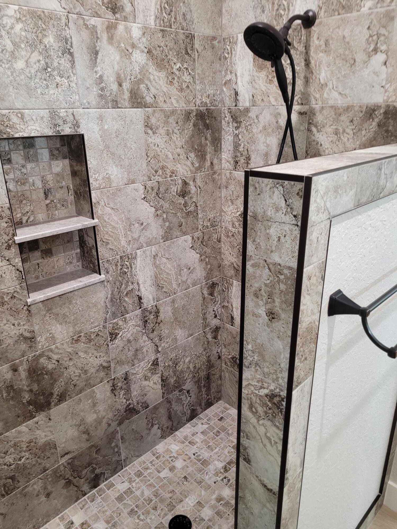 4544 Celestial Drive Grant Valkaria, FL 32949 - Photo 50 of 73 a bathroom with a shower